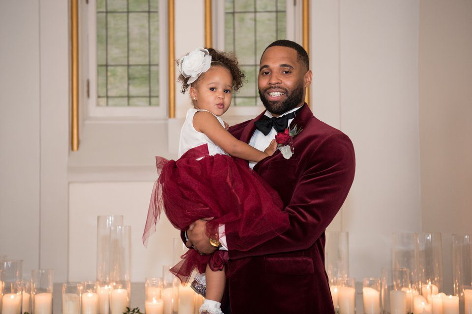 Groom and his flower girl daughter