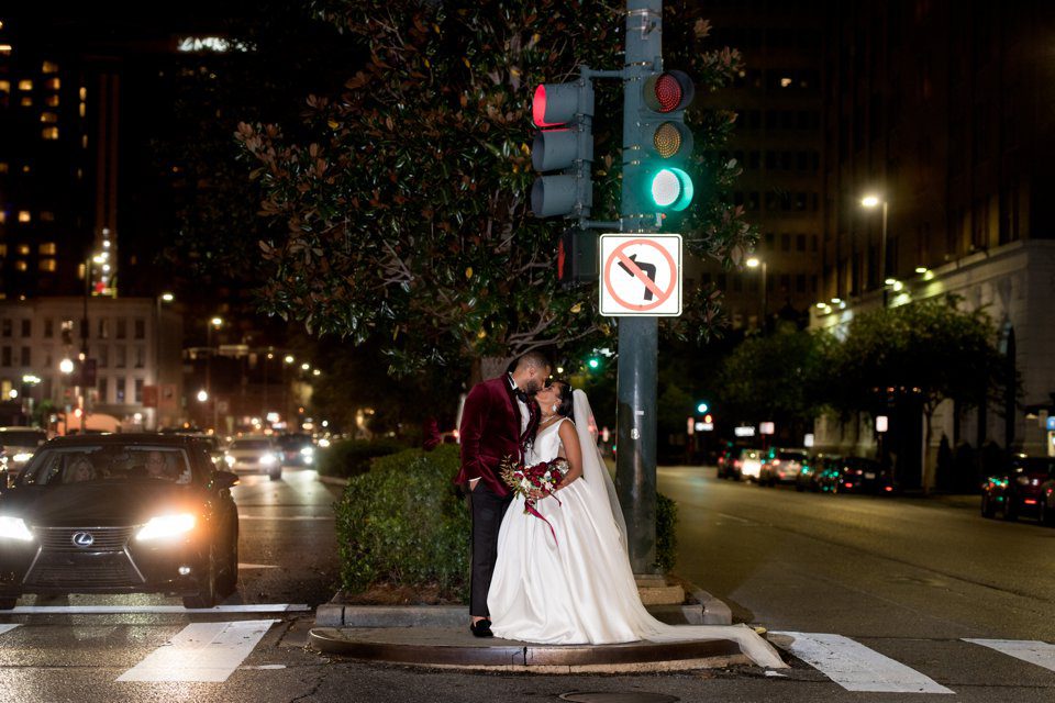 Newly married African American couple on St. Charles Avenue and Poydras St