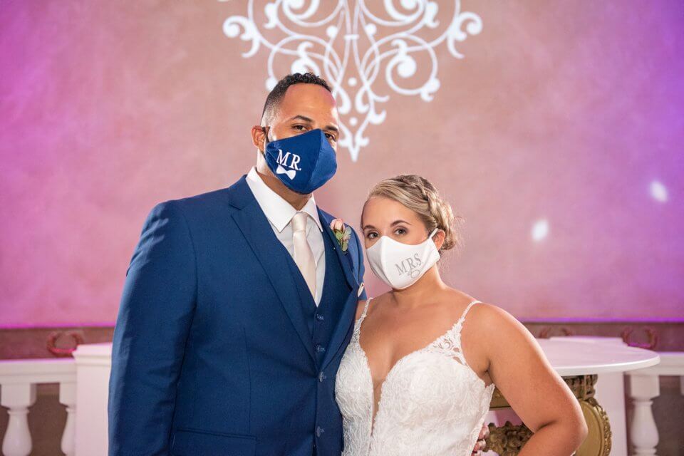 Bride and Groom wedding masks at Balcony Ballroom